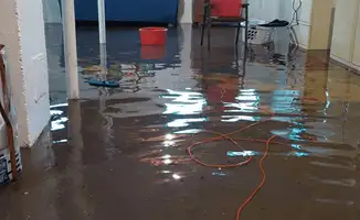 Basement with boiler, cabinets and washing machine completely flooded in Charlotte, NC